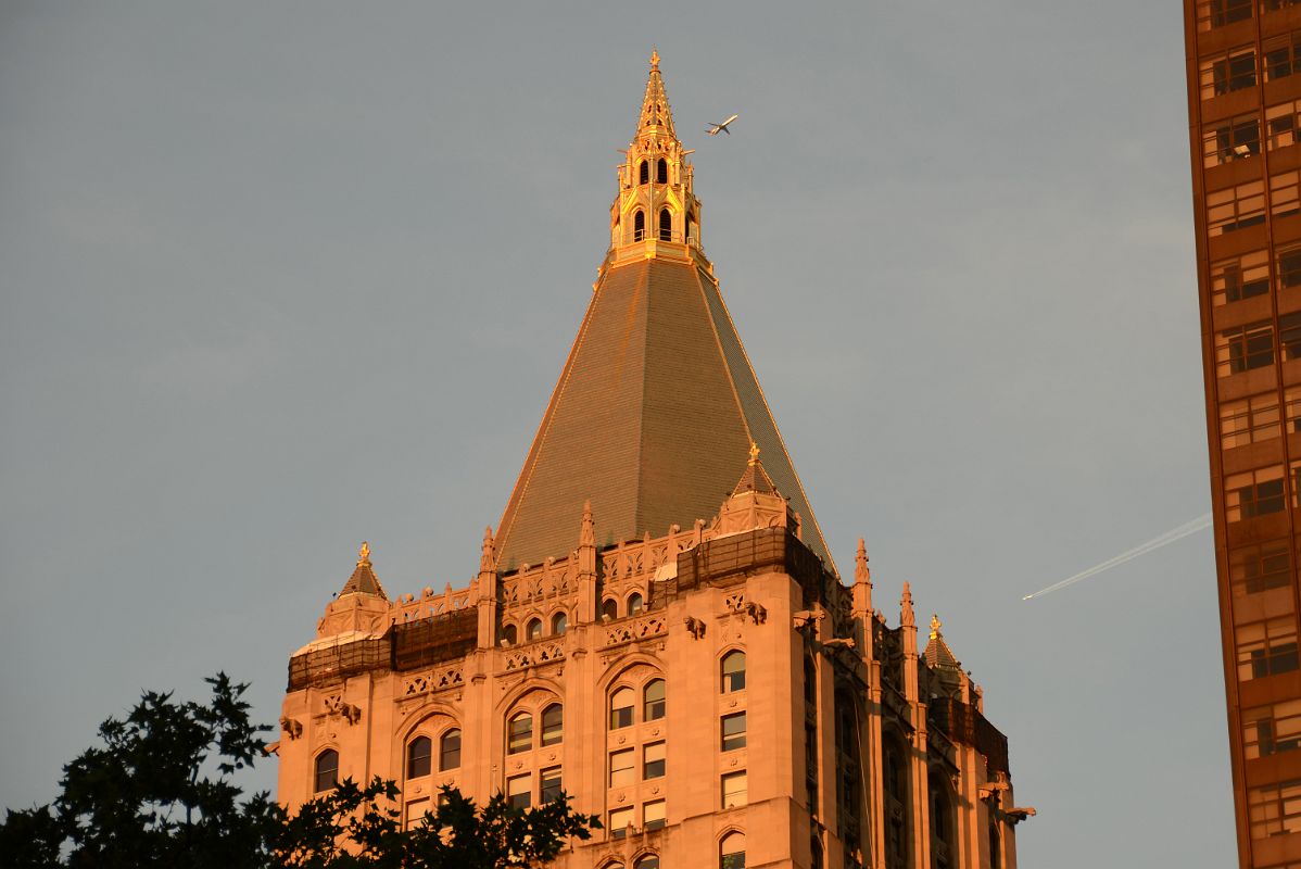 10-02 New York Life Building Pyramidal Gold Gilded Roof At Sunset With Planes Flying By At New York Madison Square Park